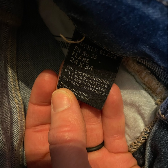 Buckle Black Flare Jeans - Picture 2 of 3